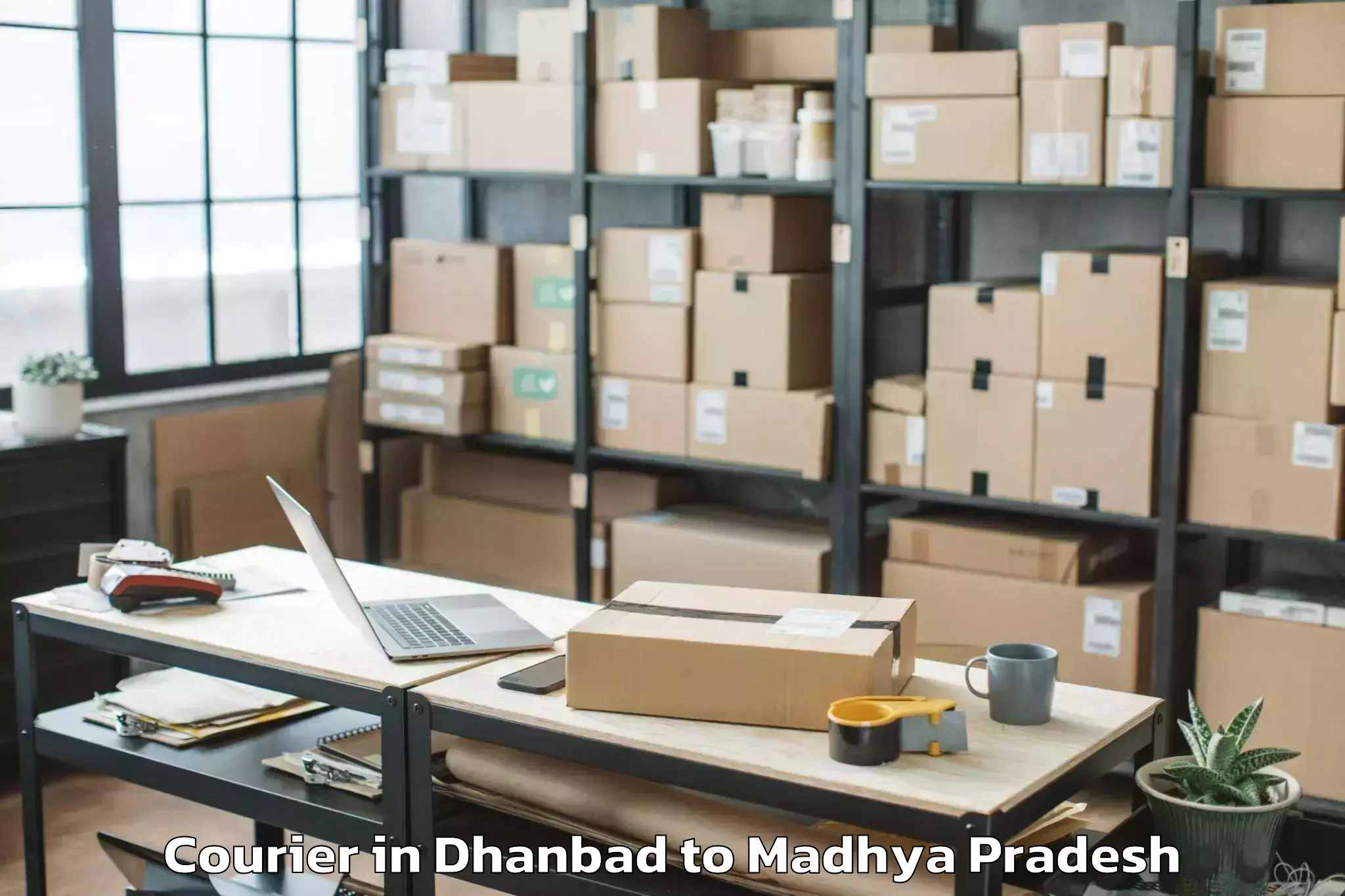 Easy Dhanbad to Dhamnod Courier Booking